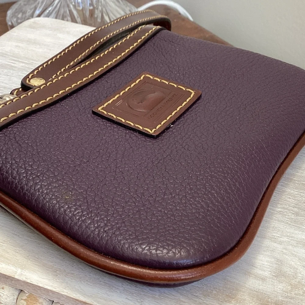 Dooney & Bourke pebbled deep purple and Brown Leather Wristlet, keychain